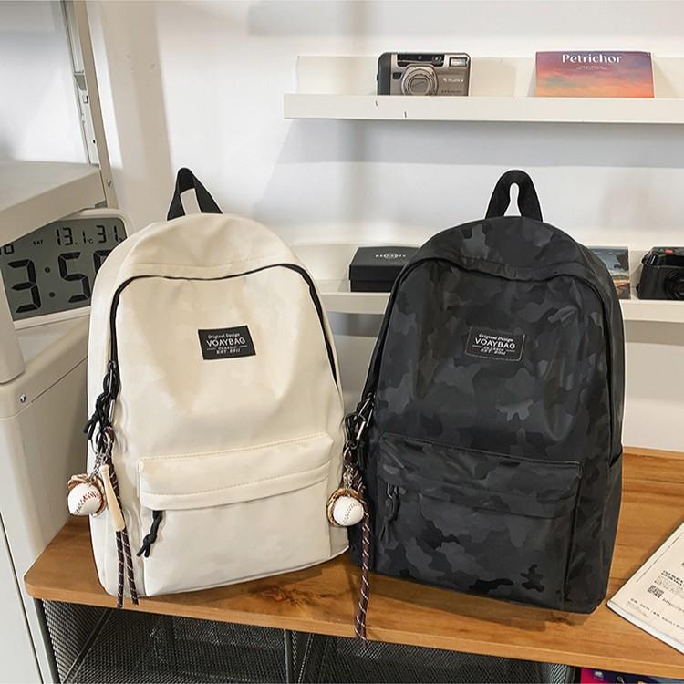 Simple and Versatile Backpack On Campus  High School Students' Large Capacity Leisure  Light Shoulders for Men and Women.