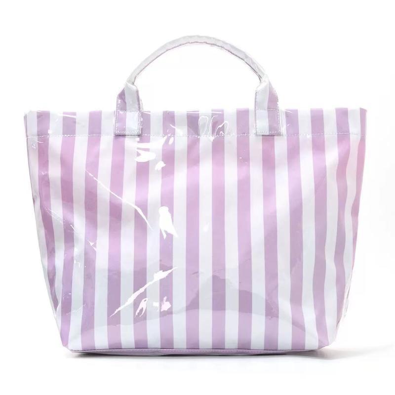 This Water-Resistant Pvc Tote Bag Features A Pink And Blue Striped Design, A Large Capacity, And Is Suitable For Beach Shopping,
