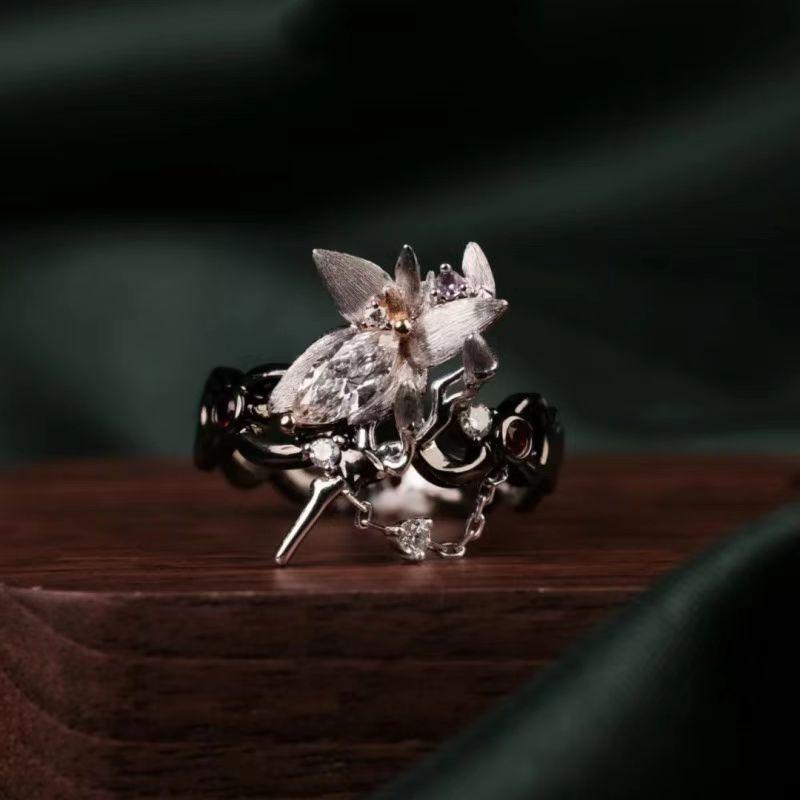 Animation Baizhi Yingxing · Blade Impression Spring Ring Design Sense Dead Wood Ring Arm Hollow Magnolia Flower Ring