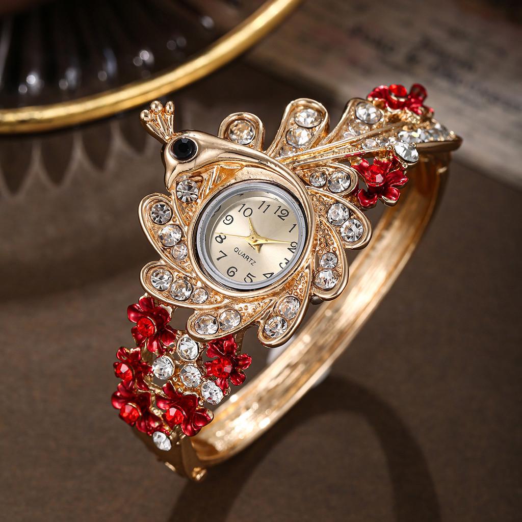 Ladies Peacock Stone Quartz Watch With Hollow Flower Alloy Bracelet For Fashion Accessory