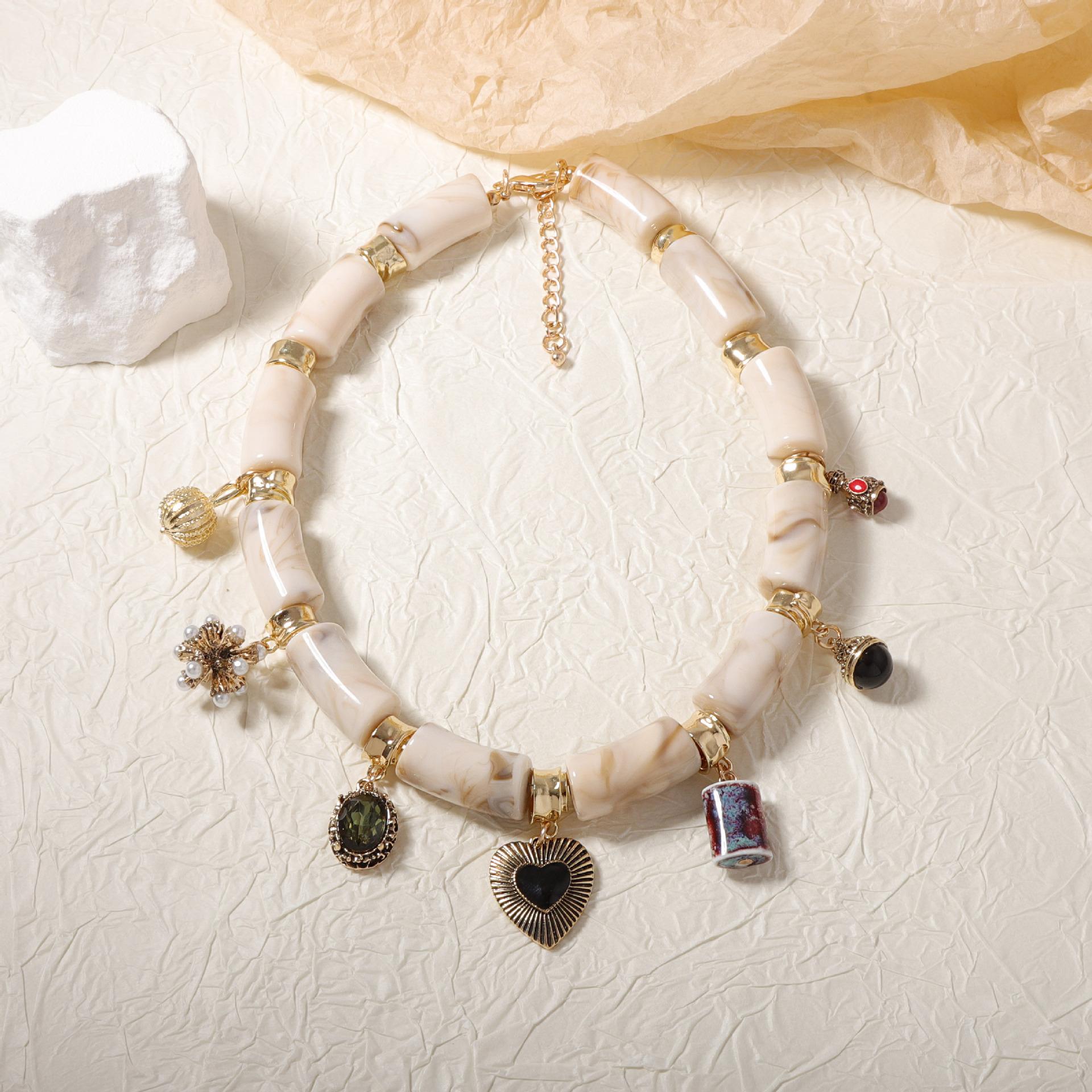 

Personality, fashion and creative design sense, various alloy pendants, resin bamboo necklaces, exaggerated niche and versatile models