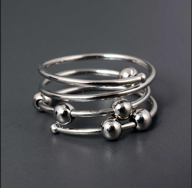 

Sterling Silver Coil Wrap Ring | Adjustable Multi-Band Fidget Ring with Smooth Balls | Modern Anxiety Statement Jewelry 12