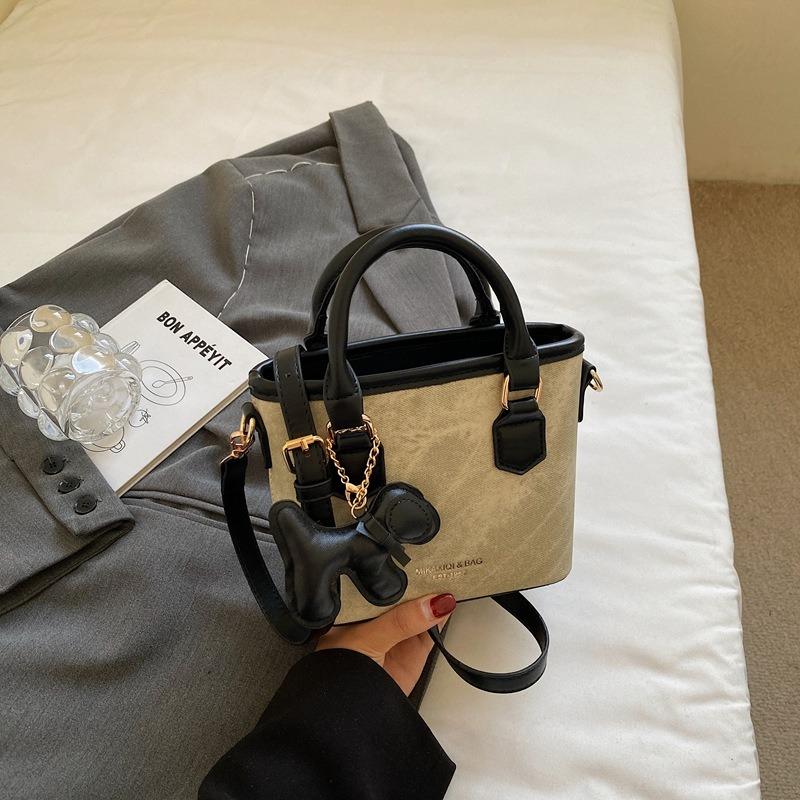 Textur trendige Nischentasche Herbst neu retro Schulter Umhängetasche Mode tragbare Eimertasche Damen
