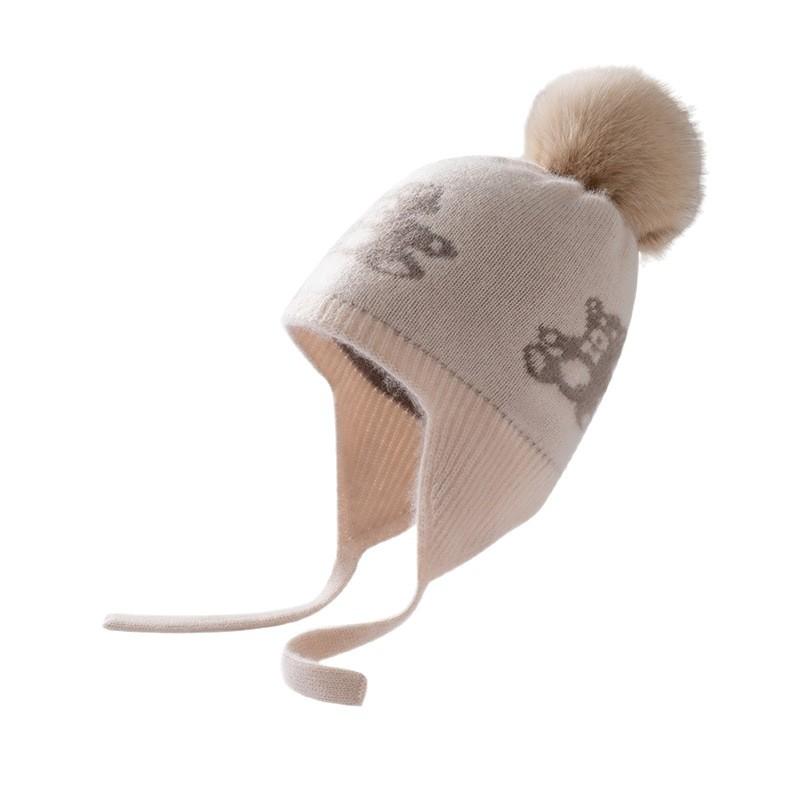 Autumn and winter children's cashmere fur ball jacquard warm knitted ear protection cashmere hat spot can be customized