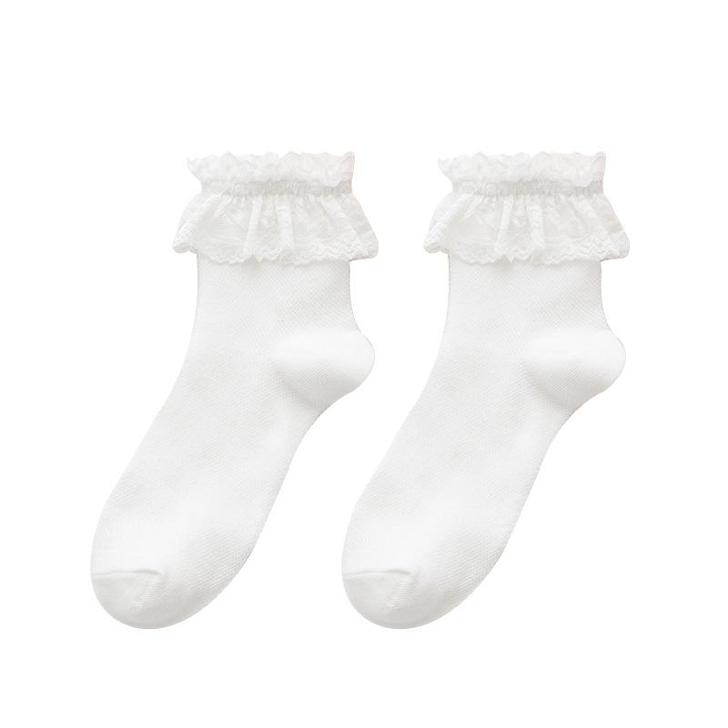 Styl Lolita japońskie Kawaii damskie skarpetki śliczne plisowane skarpetki z falbanką solidna biała czarna siatka koronkowe dziewczęce słodkie krótkie skarpetki w stylu Harajuku