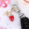 Handmade Strawberry Bowknot Keychain for Women and Girls Featuring Sturdy Alloy Material and Bright Colors