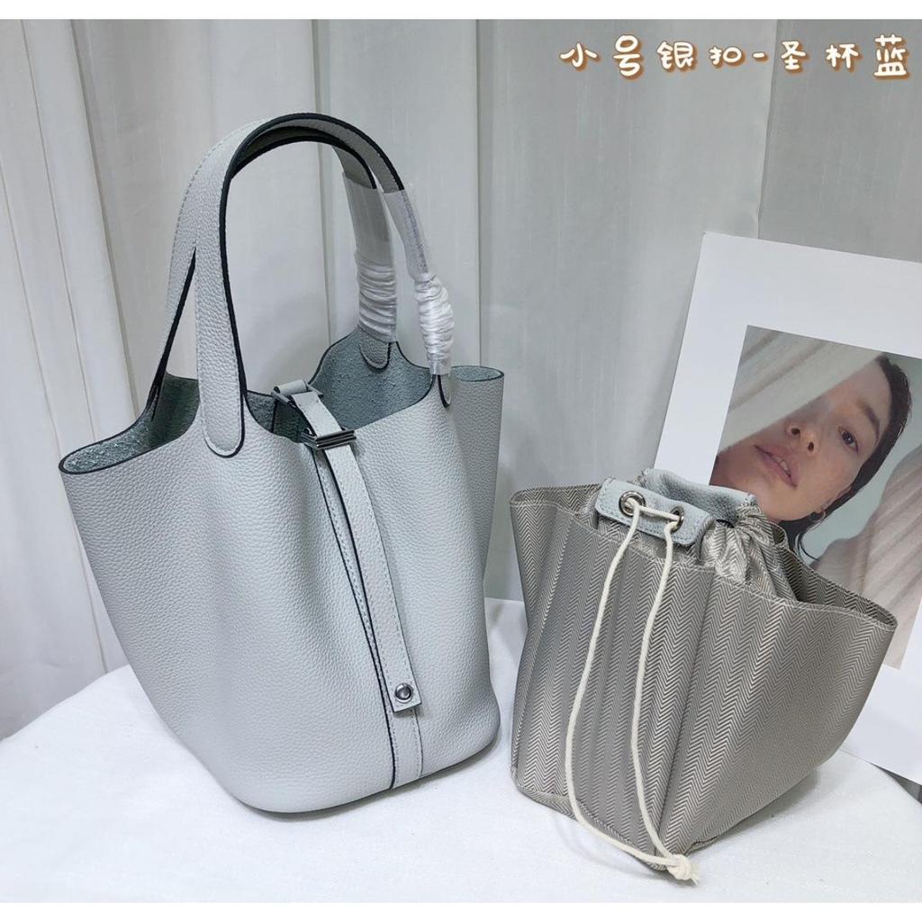 Spot wholesale top layer cowhide vegetable basket bag leather bucket bag commuter fashion lock buckle hand-held handbag woman