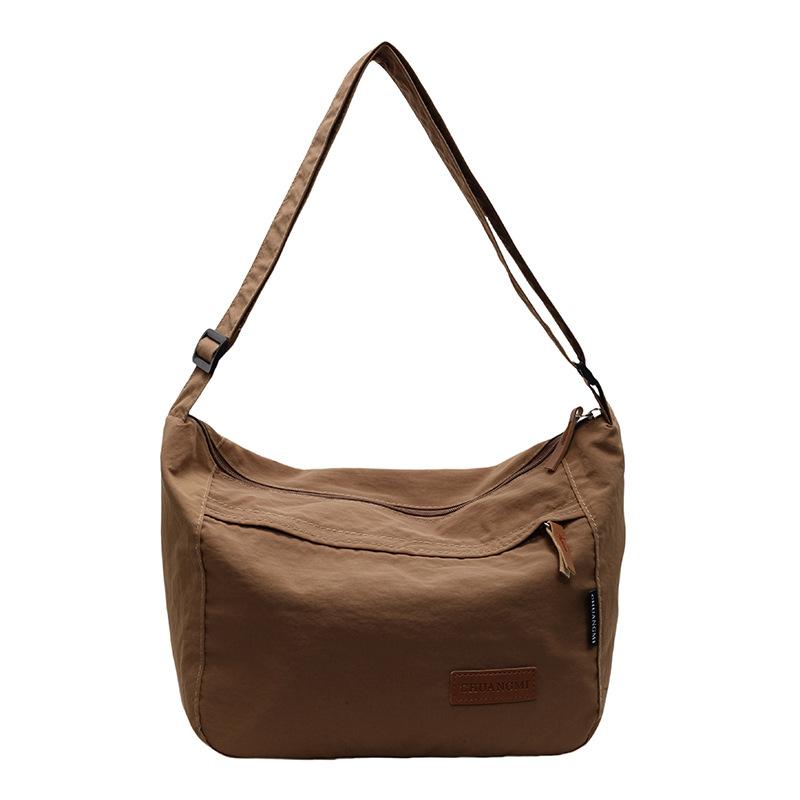 

Japanese leisure lazy style student commuting tote bag large capacity simple solid color lightweight versatile messenger bag female коричневый