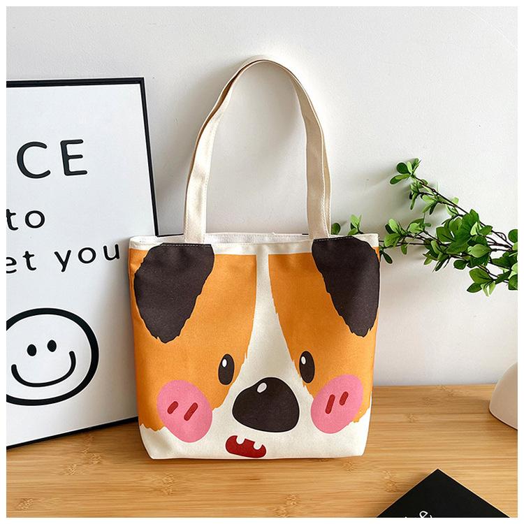 

Мультяшная милая собачка повседневная наплечная холщовая сумка новая студенческая сумка офисного работника большой вместимости портативная сумка для покупок оранжевый