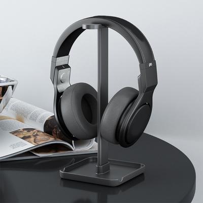 Modern Headphone Display Stand Featuring Slip Resistant Base Compact Design And Device Storage Rack Compartment