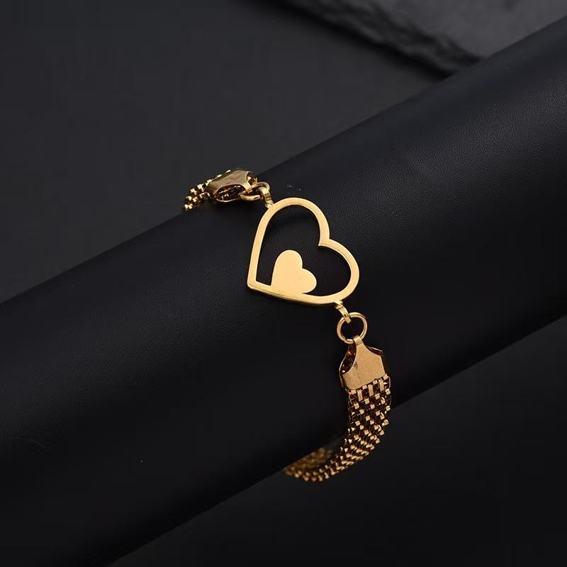 18K Stainless Steel Waterproof Hollow Heart-Shaped Adjustable Bracelet for Women Fashion Simple Twist Braided Bracelet Jewelry
