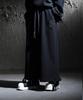 Kileutimuka Logo Embroidered Hem Strap Pants