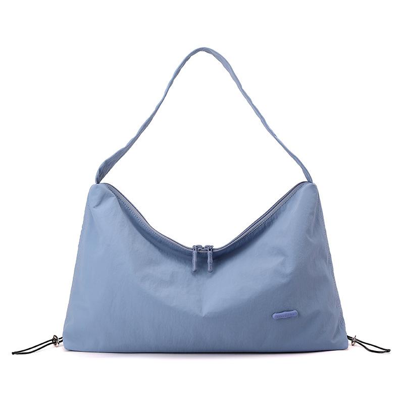 Korean style spring and summer new women's solid color high-end niche shoulder crossbody armpit bag