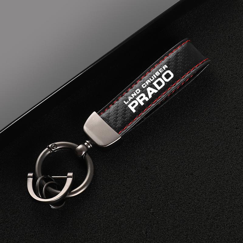 

Leather car keychain Horseshoe Buckle Jewelry for Toyota Prado 120 Fj150 Land Cruiser with logo car Accessories червоний