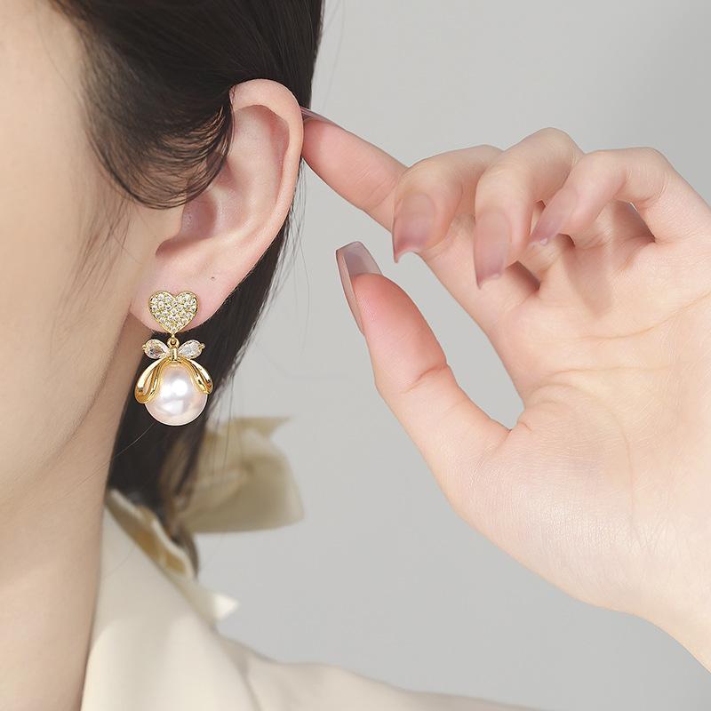 S925 Silver Needle Korean Fashion Versatile Micro-inlaid Zircon Peach Heart Bow Pearl Stud Earrings Femininity Elegant Earrings 2026