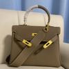 2026 nova bolsa de couro togo com alça larga para ombro, bolsa de mão de couro bovino de primeira camada, bolsa feminina original para ombro único e transversal