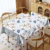 A Rectangular Tablecloth Featuring an Ocean Theme with Starfish And Shell Patterns, Suitable for Both Indoor And Outdoor Use. It Is Machine Washable A