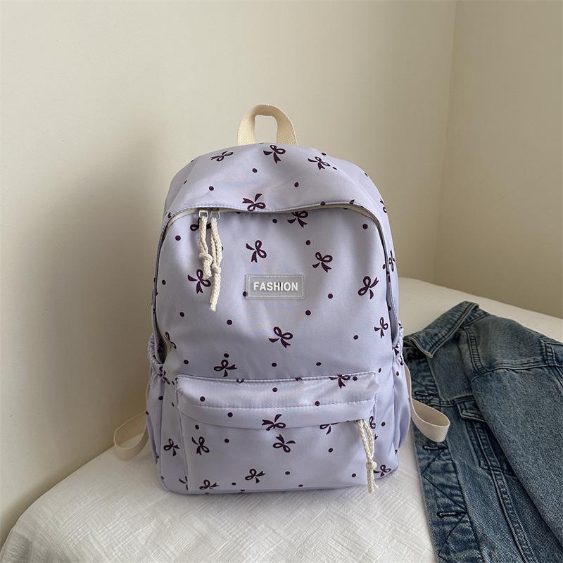 

Student schoolbag new large-capacity backpack Student class schoolbag backpack Bow travel Campus wind backpack фиолетовый