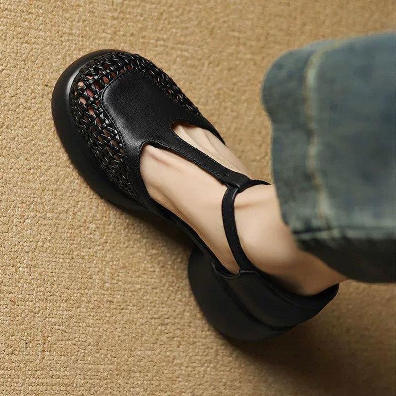 

Huge soft leather hollow bag head sandals women s 2025 summer new waterproof table thick heel thick sole high heel Roman women s shoes 35 чорний