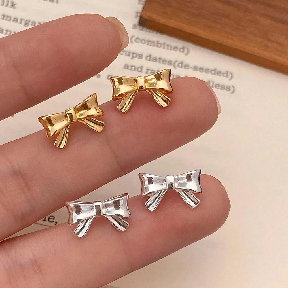 

Chic Metal Bow Stud Earrings - Minimalist, Cold Style, No-Remove Design for Women