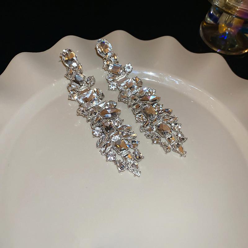 Silver Needle Water Drop Tassel Earrings - Light Luxury High-End Design for Women's Fashion.