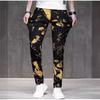 New Men's Jeans With Gold Print Trend Slim Fit And Elastic Small Leg Mid Waist Flower Pants Trend