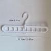 Magic Foldable Clothes Drying Rack: Nine-Hole Multi-Hanger for Space-Saving Storage