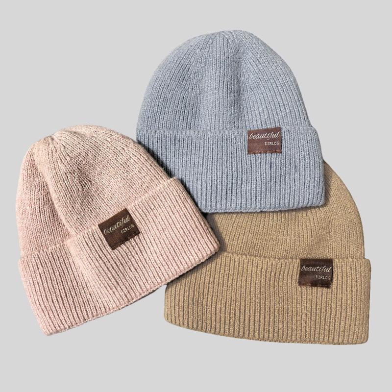 Women's Winter Fleece-Lined Woolen Knitted Hat - Warm & Stylish