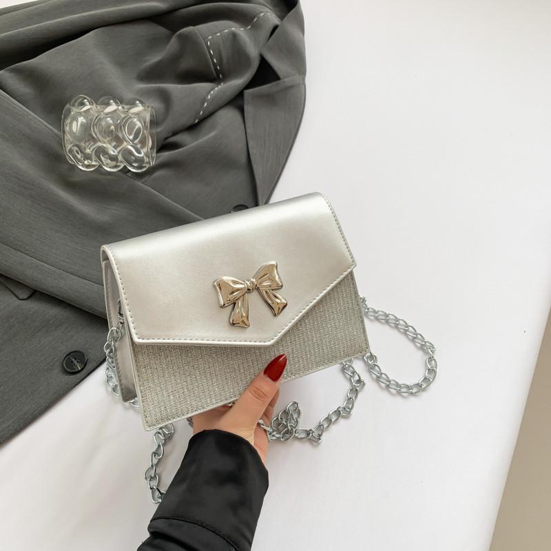 Modische Frühjahrs-Schmetterlingsknoten-Umhängetasche in eleganten Unifarben für einen trendigen Stil