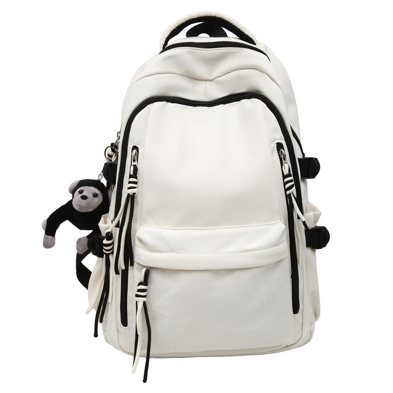 Ryggsäck för män i enfärgat utförande Ryggsäck för kvinnor med flera fickor Stor kapacitet Student Skolväska