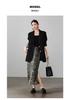 Design sense printed high waisted split skirt 2026 spring fashion commuting versatile mid length straight tube skirt