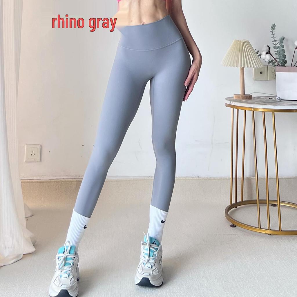 Seamless Zero-Feel Yoga Pants: High-Waisted, Bare-Skin Comfort, Back Pocket, Peach Butt Lift, Tight-Fit for Running and Fitness.
