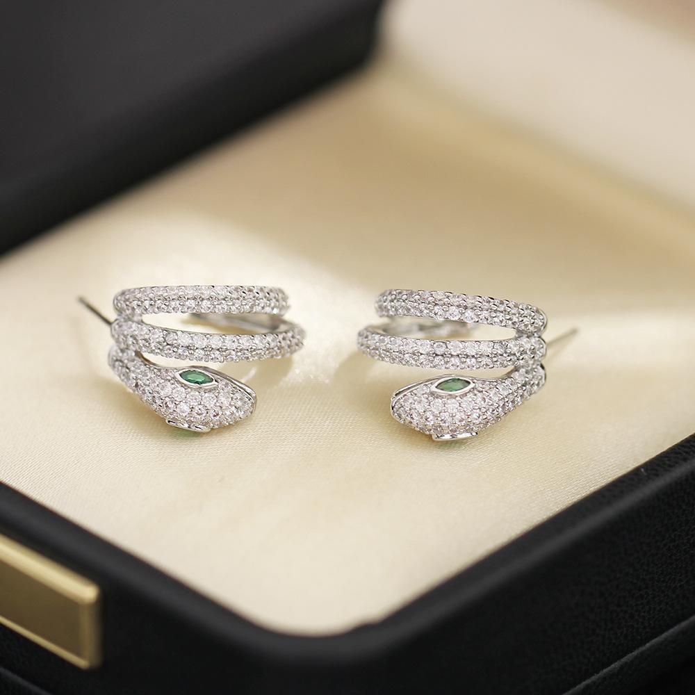 European and American niche, stone-inlaid, exquisite gold and silver two-color snake earrings, gilded, versatile, silver needle, zodiac animals, studs