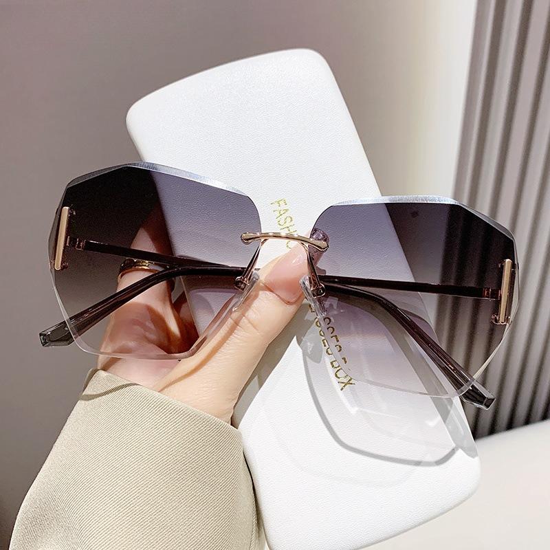 

Sunglasses women s UV protection frameless high-end feeling big face thin plain sunshade glasses fashionable outdoor sunglasses