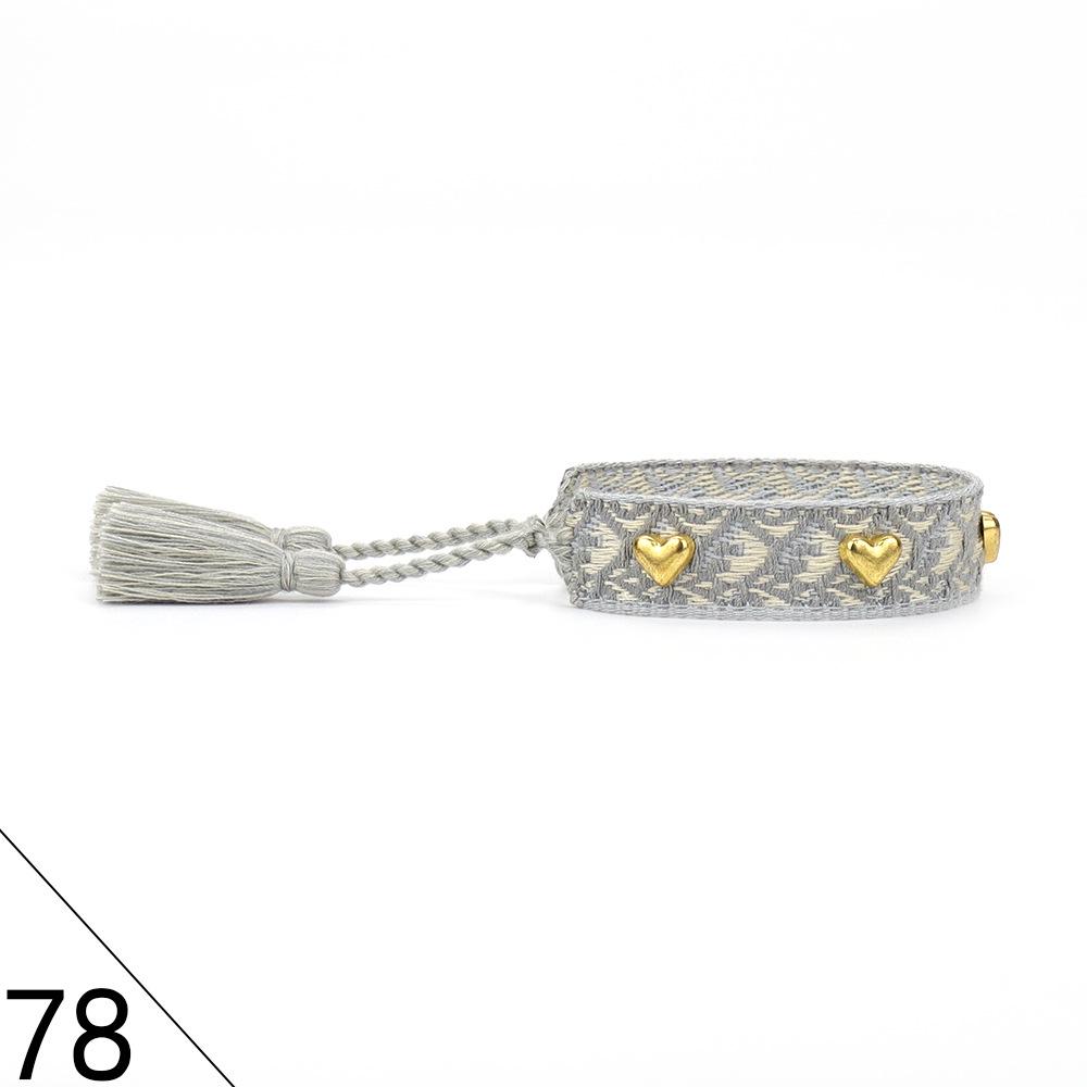 European and American Rivet Metal Heart Tassel Woven Bracelet for Women