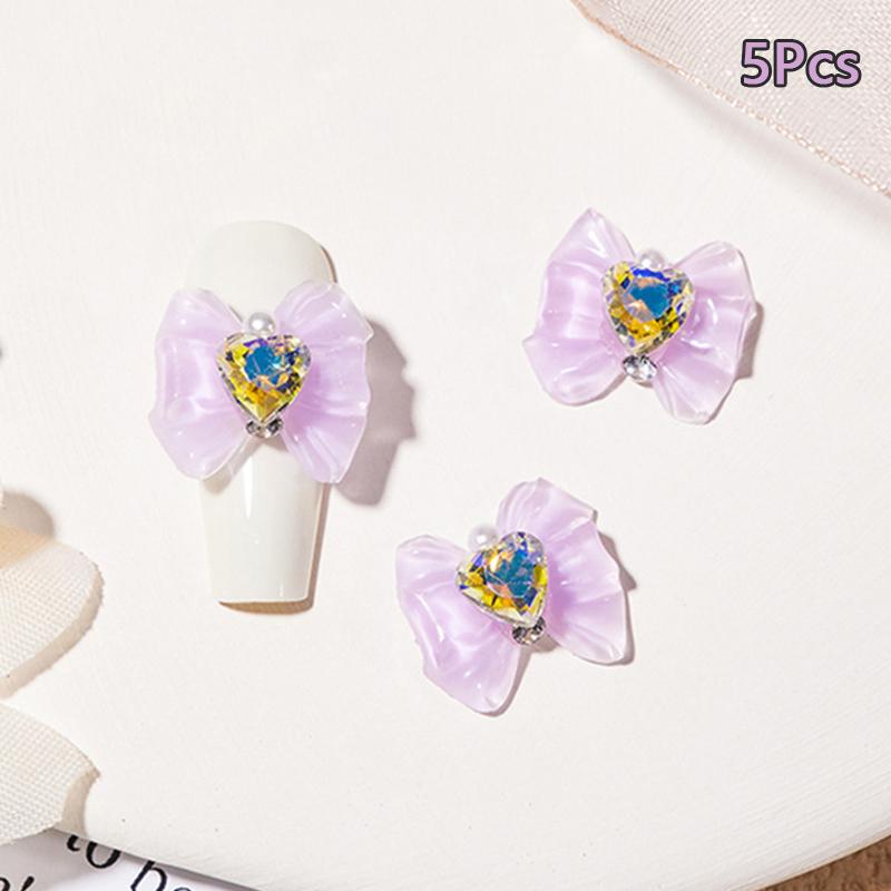 5 Stück 3D Harzschleife mit Glitzerherz Perle Nail Art Schmuck Dekorationen Frauen Nagelstudio Luxus Maniküre Charms