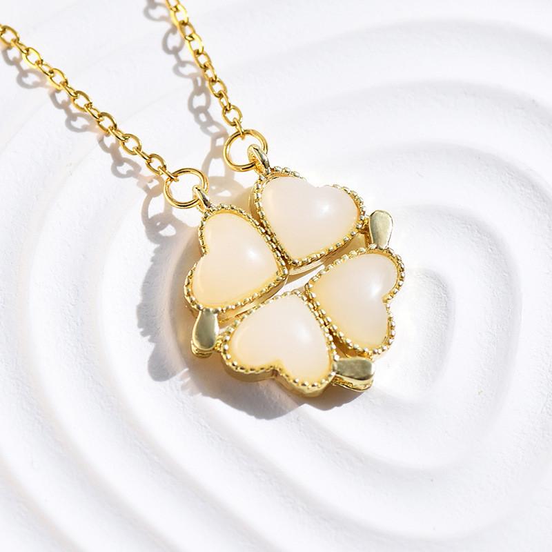 Captivating Titanium Steel Four Leaf Clover Heart Necklace Enhanced With Gold For A Dazzling Look