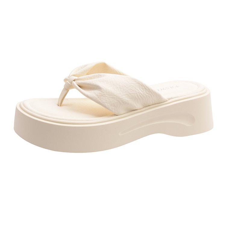 

Fairy wind~ thick-bottomed flip-flops female 2025 summer new Internet celebrity height increase versatile casual wear beach drag 40