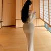 One-Shoulder Apricot Long-Sleeve Knit Dress for Women with Cinched Waist and Fishtail Skirt - A Figure-Flattering and Hip-Hugging Autumn Dress.
