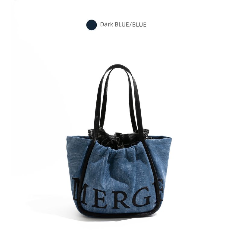 

Style Studio Thailand Niche Fashion Brand Woven Pink Bag Women s 2025 Early Summer Wear Portable Tote Bag Dark Blue