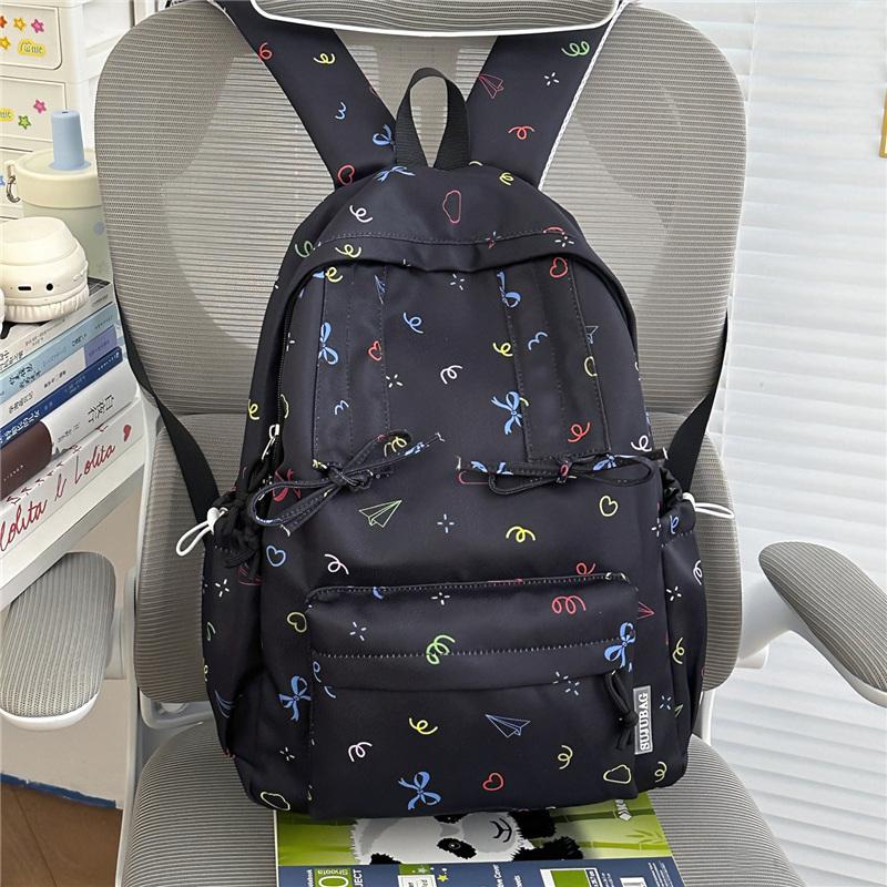 Cute Bow Tie Print School Backpack Lightweight Nylon Zipper Daypack with Front Pocket for Teen Girls Daily Travel