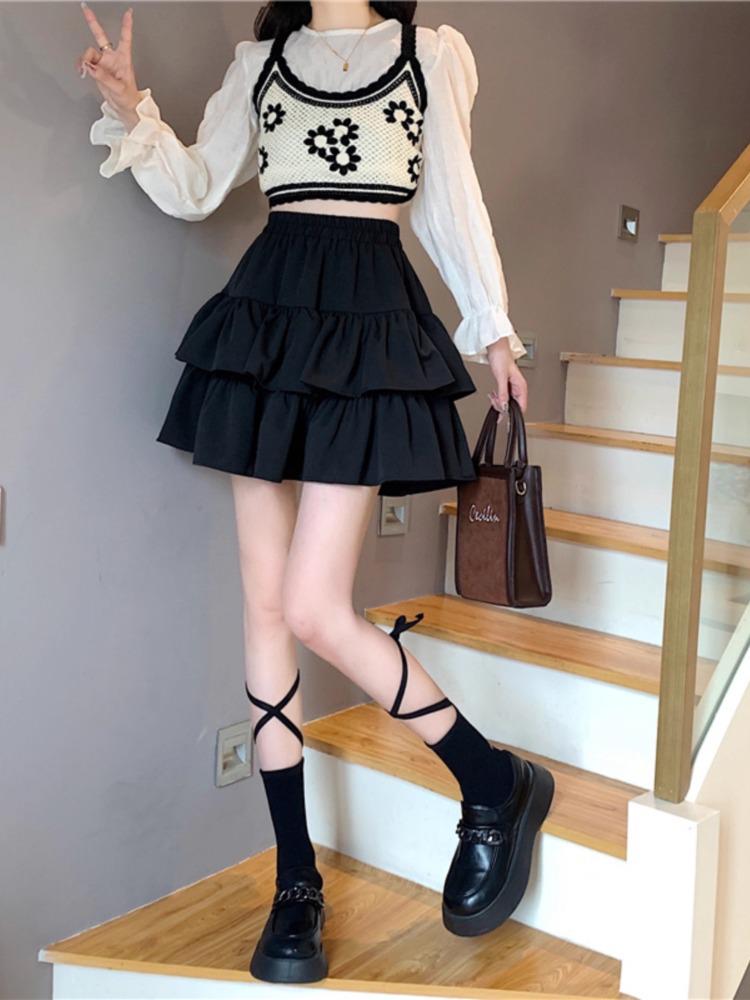 Modischer schwarzer Midi-Rock 2025: Rüschen-Schlankheitsdesign, Hohe Taille, Große Größen, Frühjahrs- und Herbst-Puff-Stil für Damen