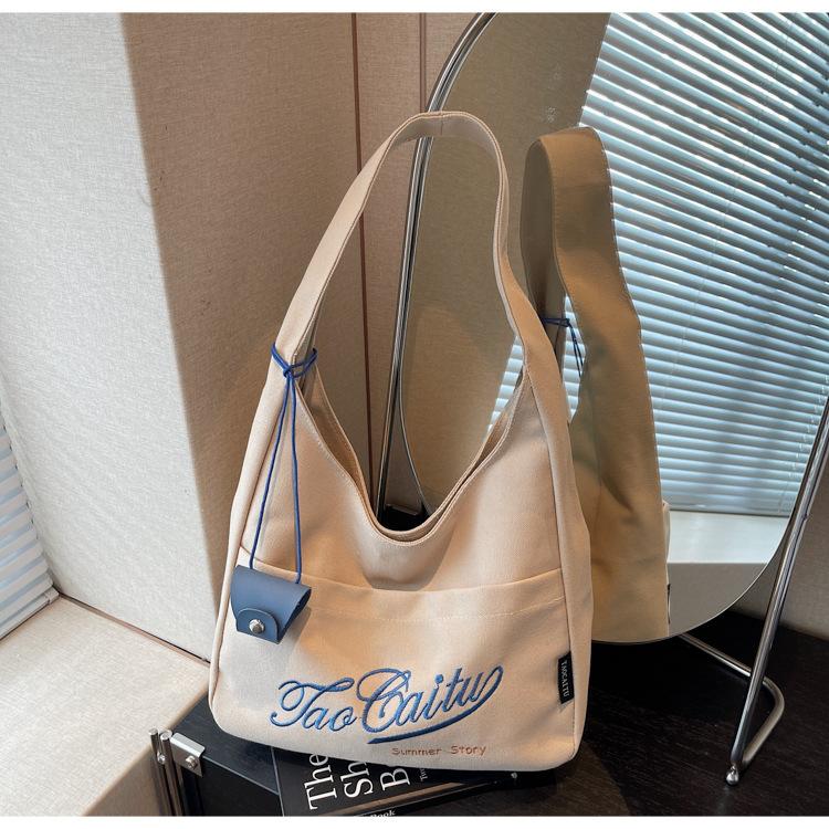 Canvas bag women's large-capacity autumn and winter versatile casual shoulder bucket bag premium tote bag