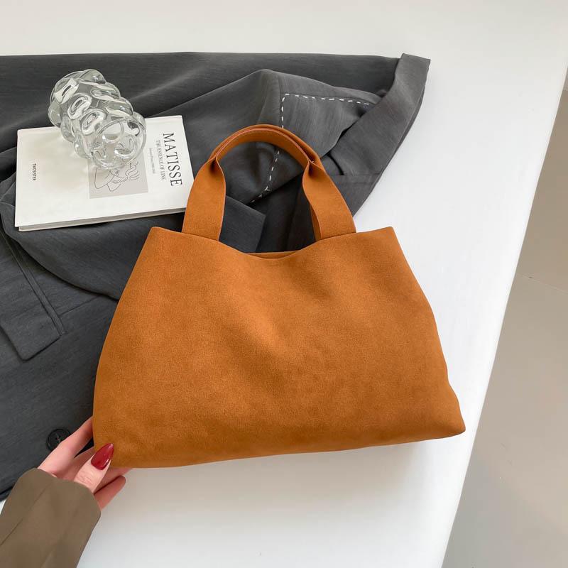 Nischen-Handtasche Herbst und Winter Retro-Mode schlichte einzelne Schulter Unterarm vielseitige Pendler-Tragetasche Damen