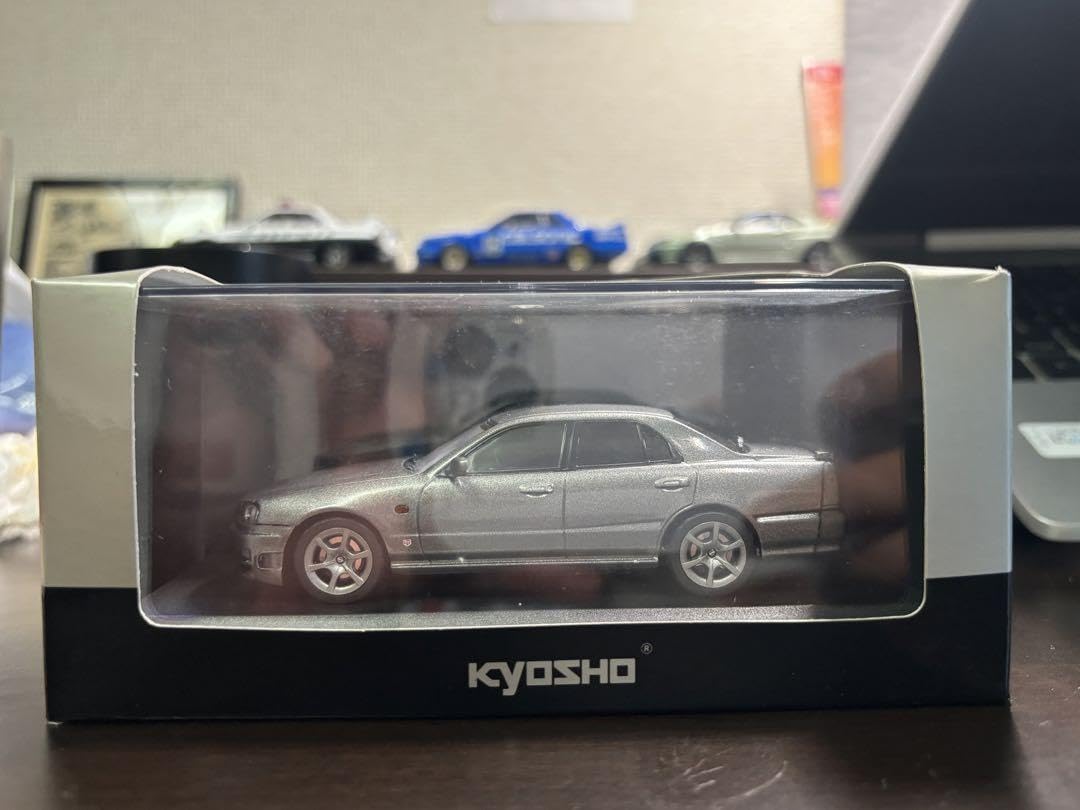 

Kyosho Nissan Skyline 25GT TURBOER34 Серебристый 1/43