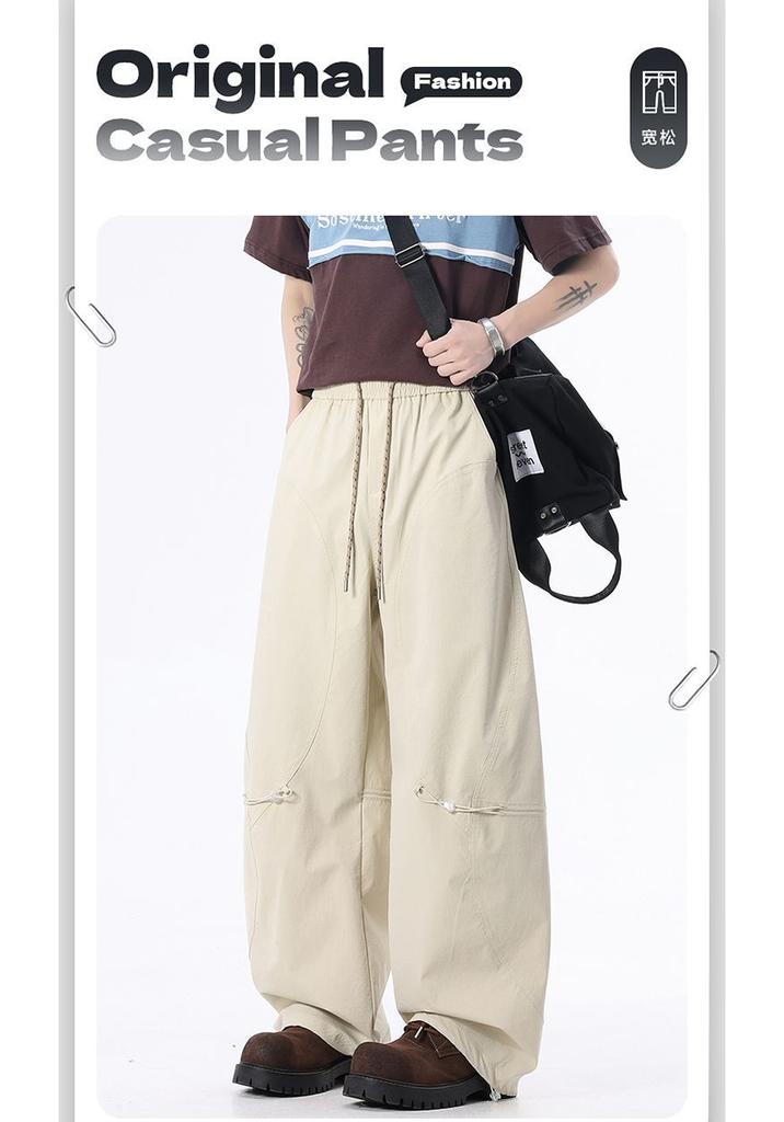 Spring and summer new European and American retro splicing light apricot scimitar loose straight casual pants men's trendy pants