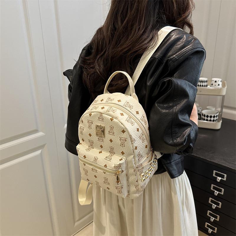 Mode trend avslappnad textur ryggsäck vår nya nisch design damväska enkel ryggsäck