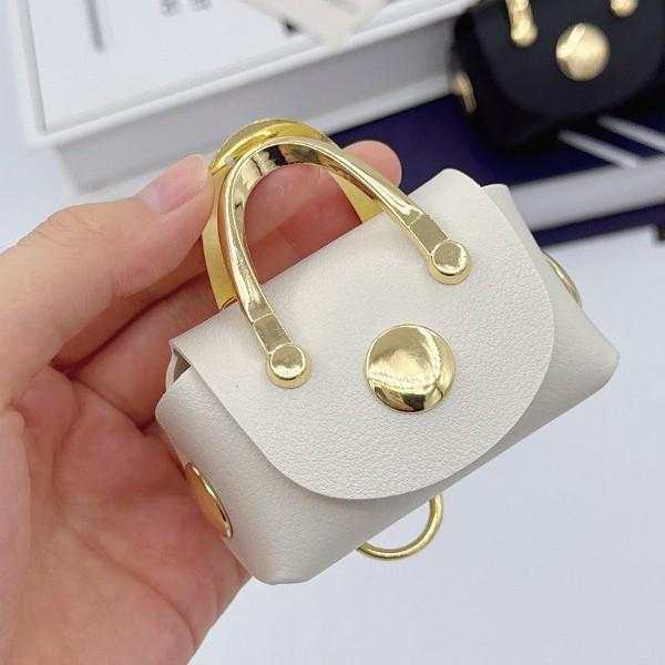 Trendy Keychain Pendant: Stylish Earphone Case, Coin Purse, and Mini Bag Accessory