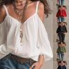 Autumn and winter new European and American women's clothing solid color suspender casual bubble sleeves holiday style top women