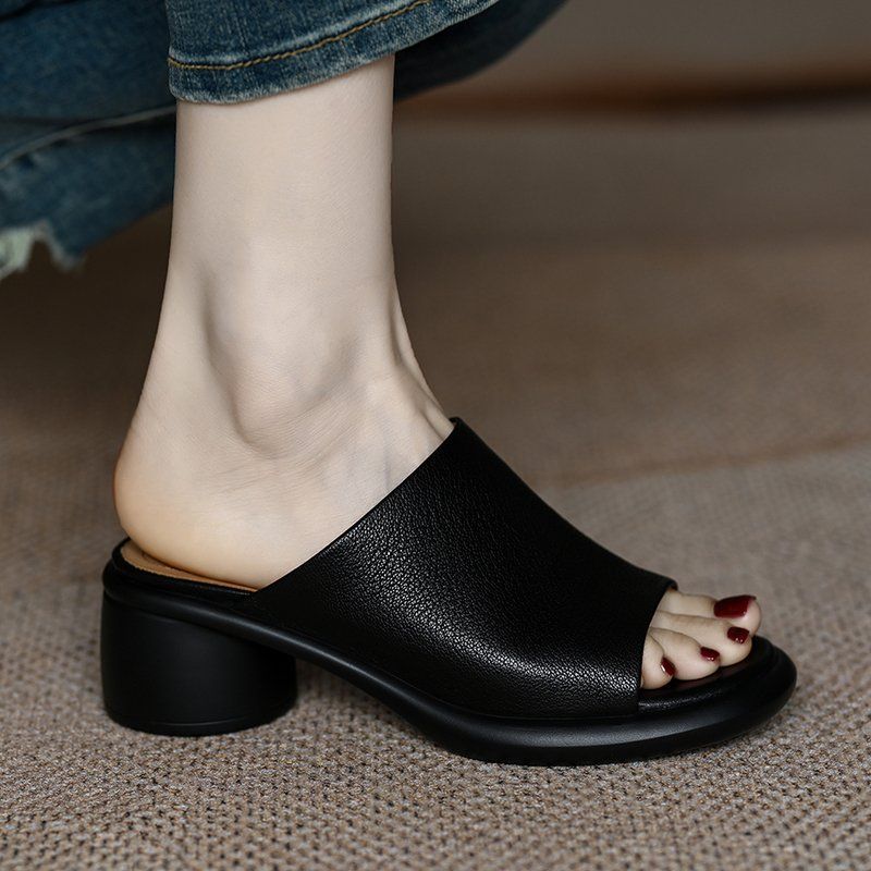 Thick-bottomed one-word drag women's new outer wear open-toed middle heel soft waterproof table heightening round head cool slippers in summer 2025